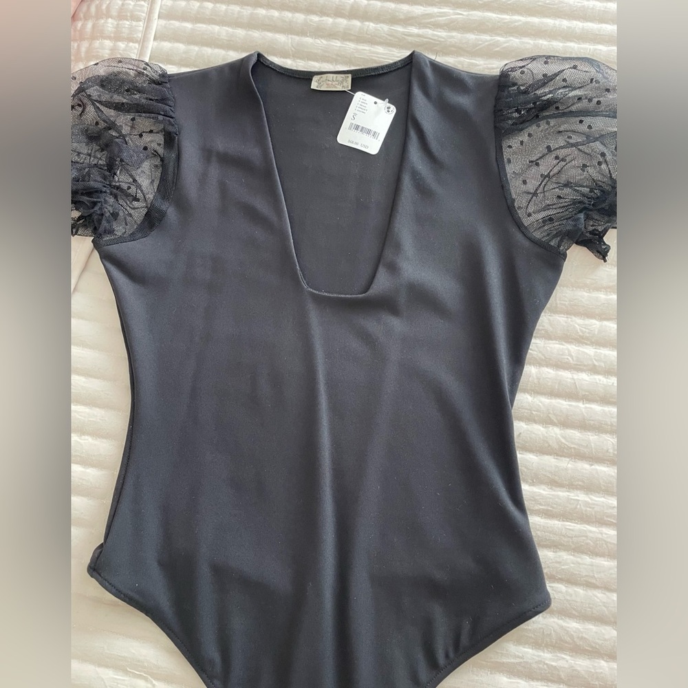Free People bodysuit with lace puffy sleeves